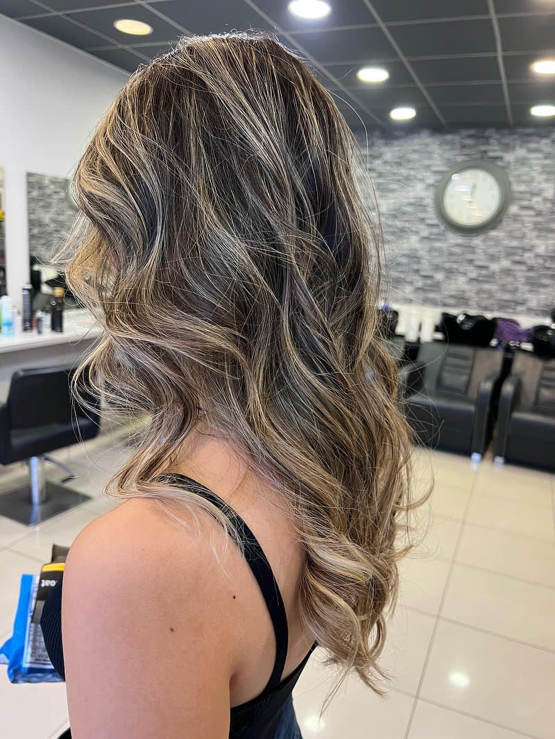 Blonde balayage with long soft waves
